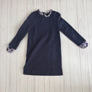 Navy dress with floral trim